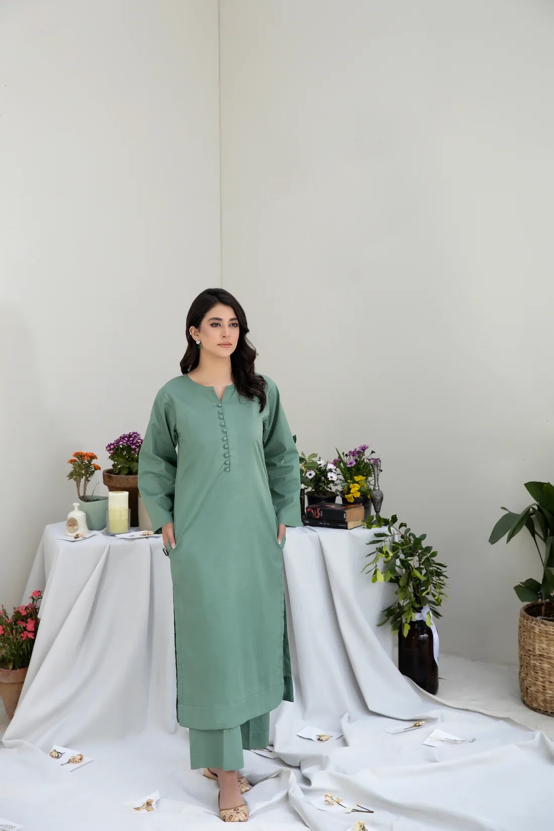 Sage green outfit, front studio portrait